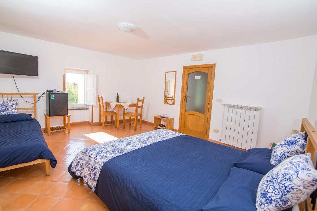 Postel nebo postele na pokoji v ubytování B&B Cassiopea