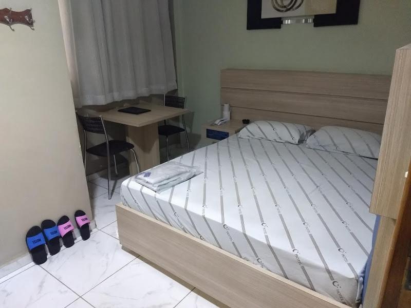 Postel nebo postele na pokoji v ubytování Hotel Flex In