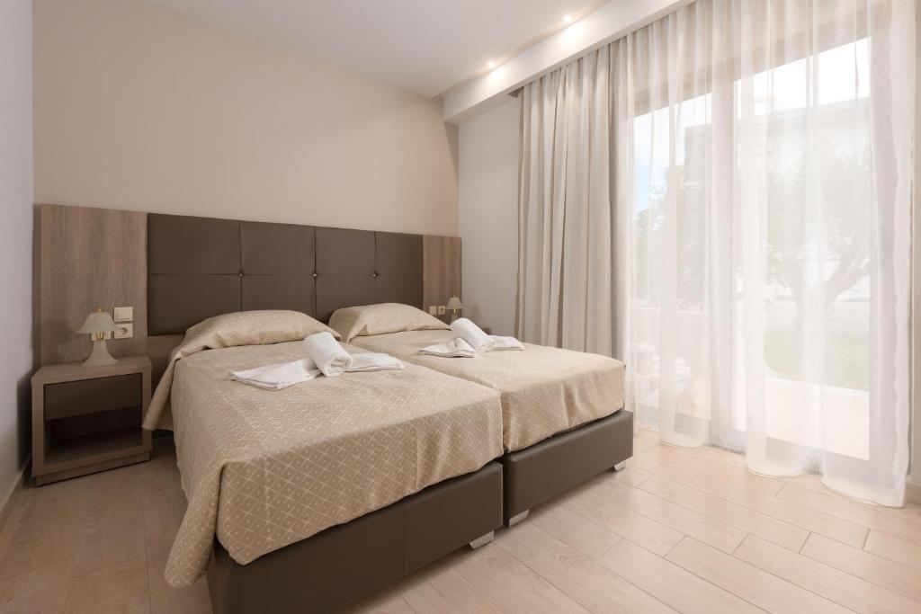 Postel nebo postele na pokoji v ubytování Saint George Resort