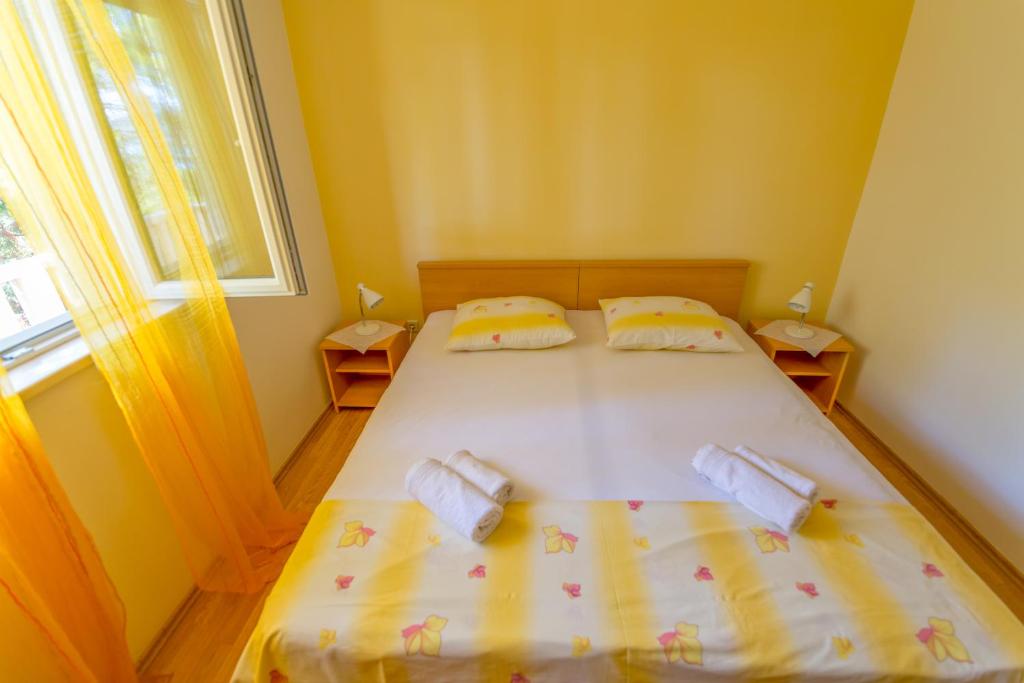 Postel nebo postele na pokoji v ubytování Rooms Karla