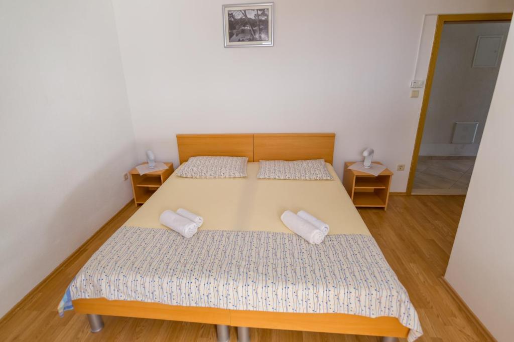 Postel nebo postele na pokoji v ubytování Rooms Karla
