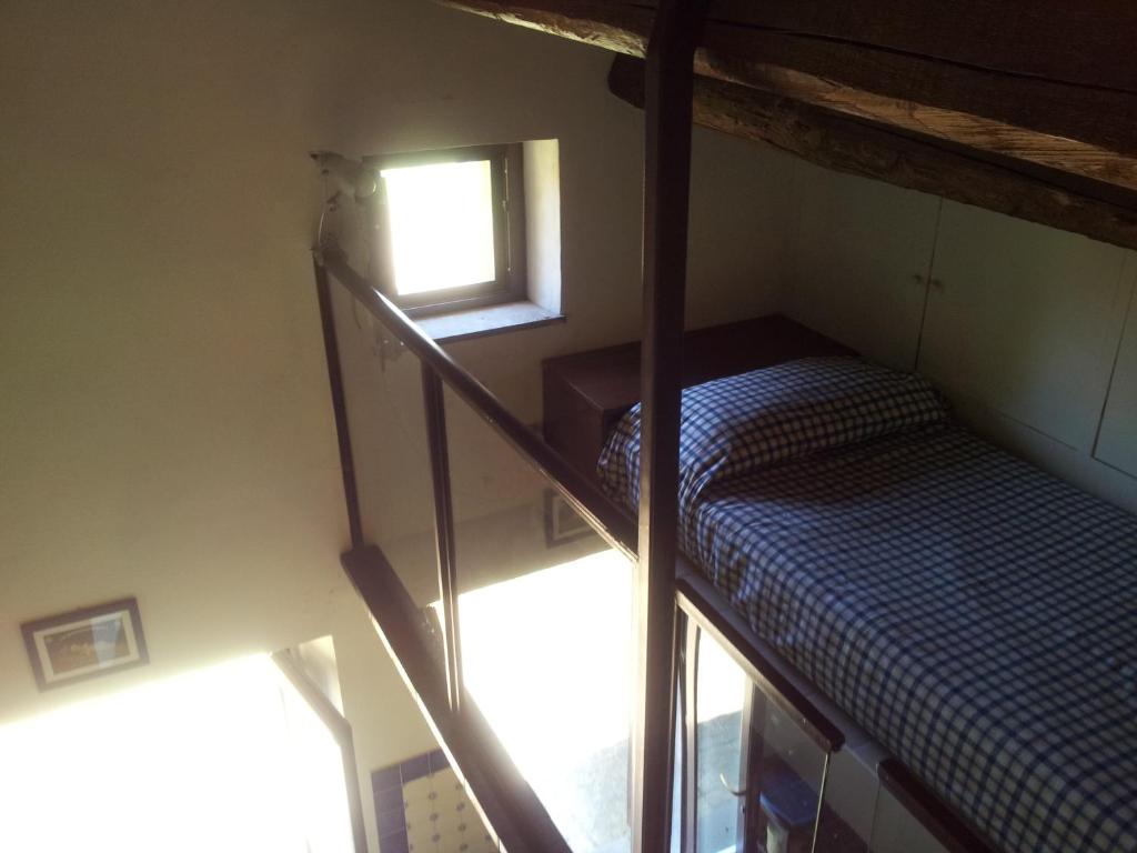 A bed or beds in a room at Bicoca - Casaletti