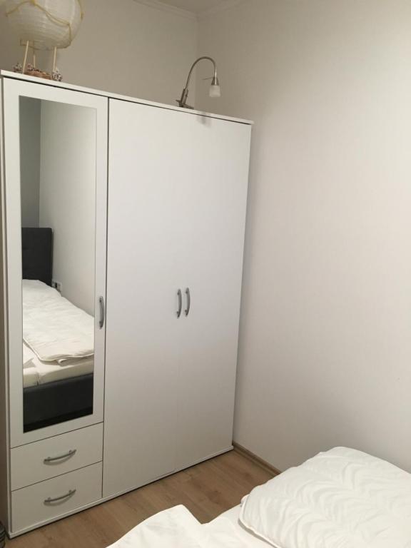 Postel nebo postele na pokoji v ubytování Ferienwohnung am DOC