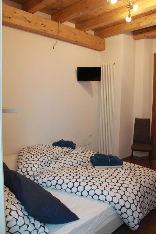 Łóżko lub łóżka w pokoju w obiekcie Affittacamere Cipri