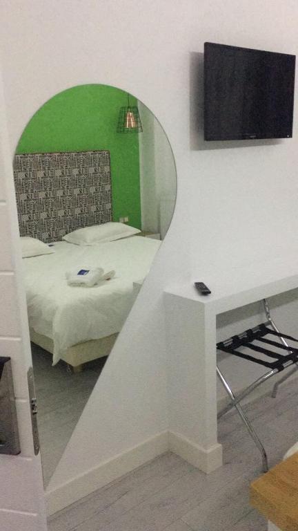 Posteľ alebo postele v izbe v ubytovaní White Bottle Superior Apartments