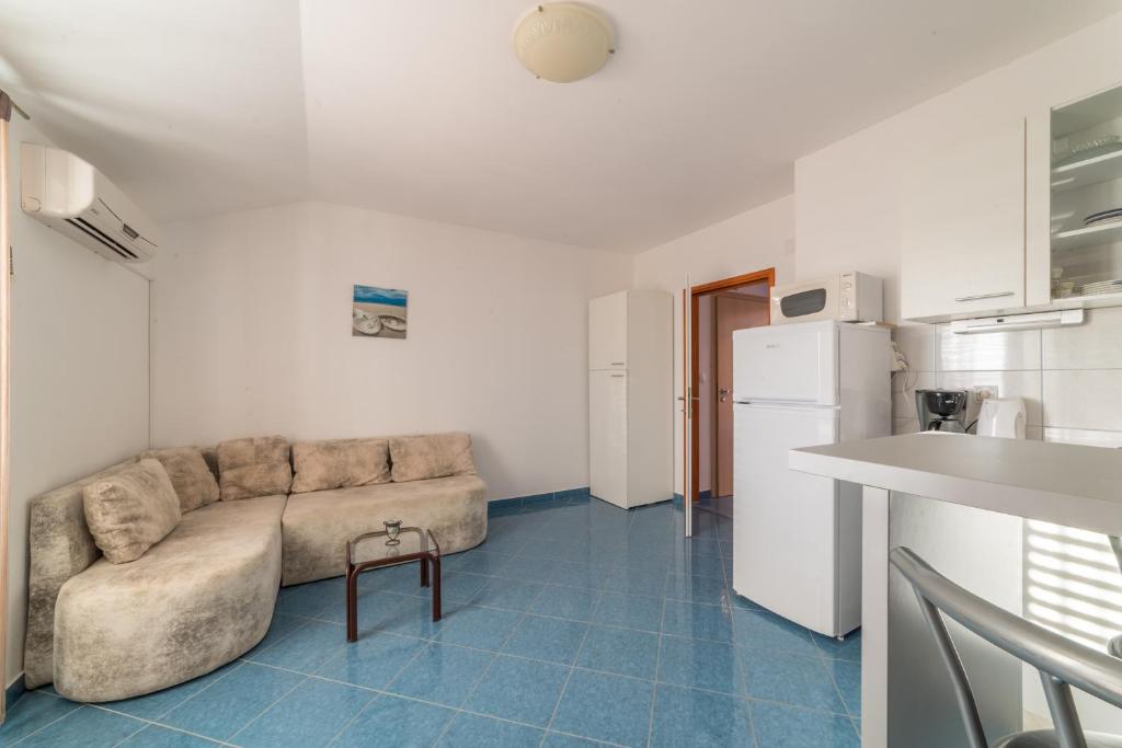 Kuchyň nebo kuchyňský kout v ubytování Apartments Jakovčev
