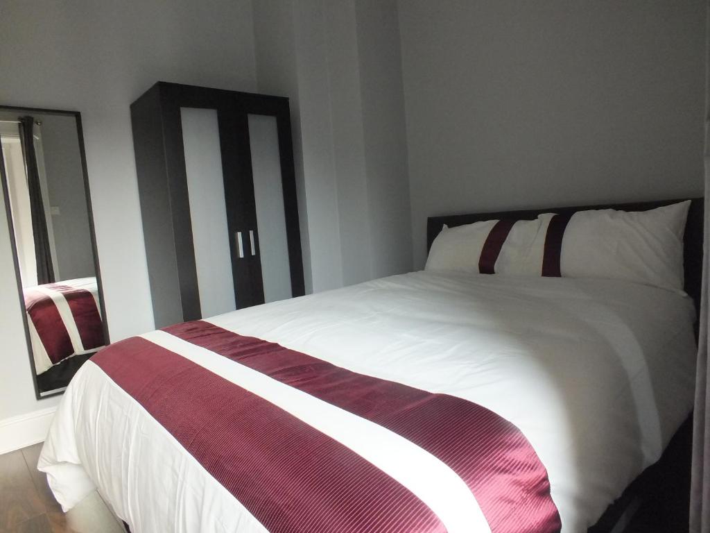 Posteľ alebo postele v izbe v ubytovaní Central Dublin Apartment