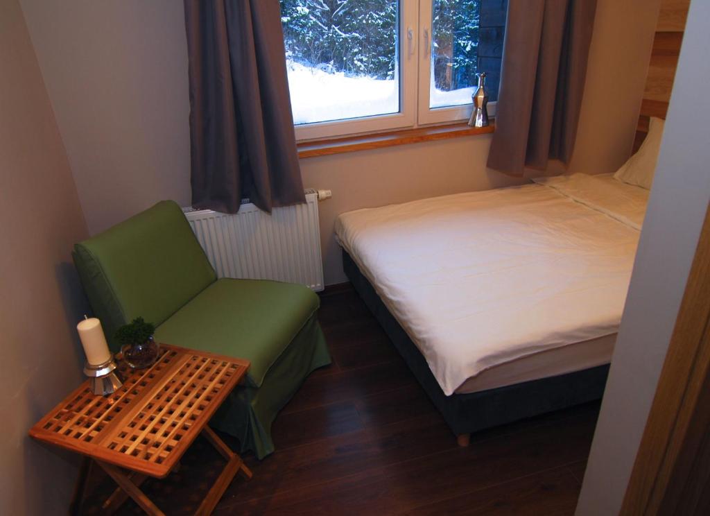 Posteľ alebo postele v izbe v ubytovaní Karolinka Guest House