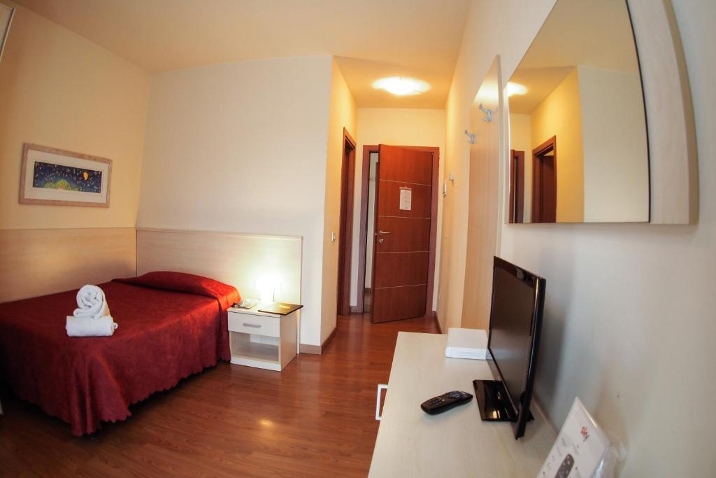 TV a/nebo společenská místnost v ubytování Hotel Break House Ristorante