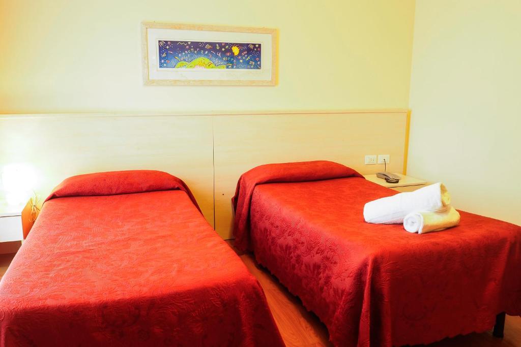 Postel nebo postele na pokoji v ubytování Hotel Break House Ristorante