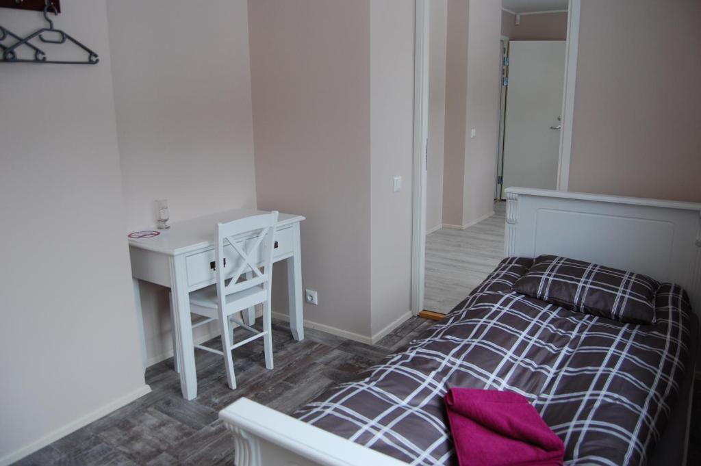 Postel nebo postele na pokoji v ubytování Kaunis Guesthouse