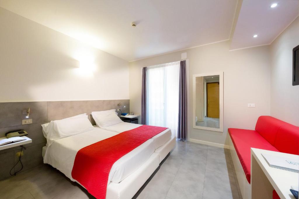 Postel nebo postele na pokoji v ubytování Hotel Garden Sea Wellness & Spa 4 stelle superior