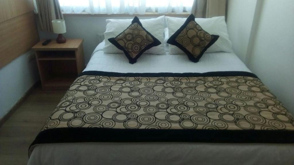 Cama o camas de una habitación en Hotel Romano