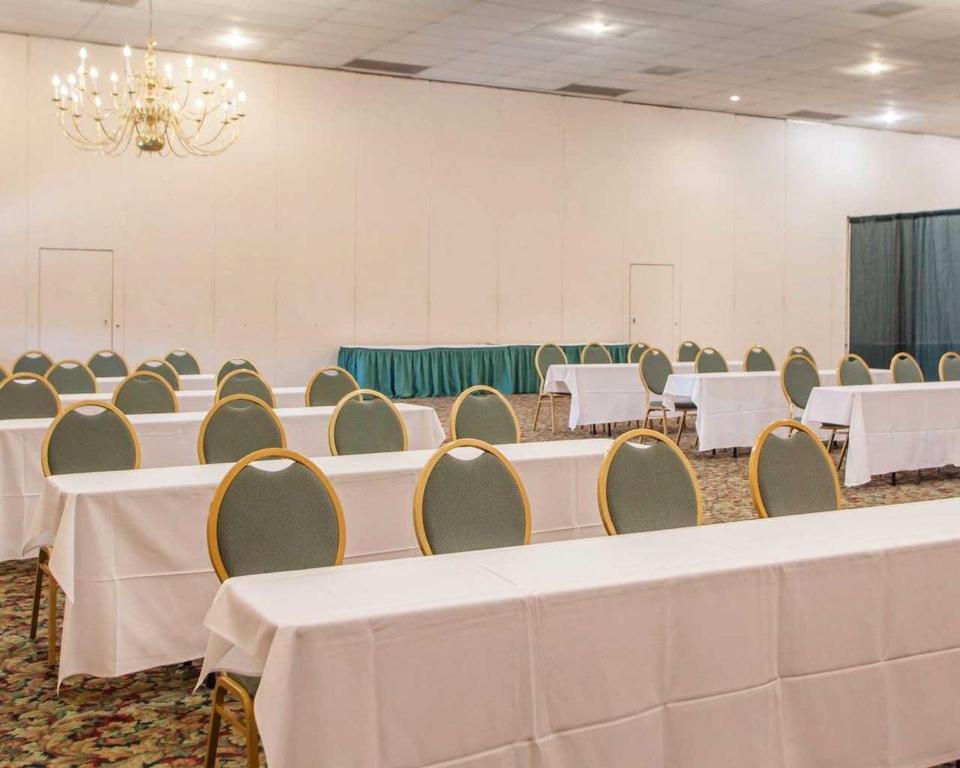 a banquet hall with white tables and chairs at Parkview Inn and Conference Center in Allentown