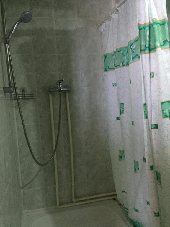 Vannituba majutusasutuses Guest House U Myrona