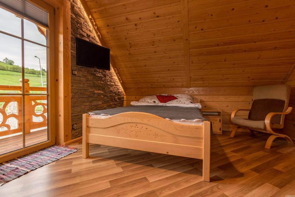 Televízia a/alebo spoločenská miestnosť v ubytovaní Góralska Chata Pieniny