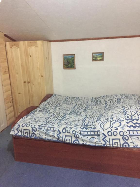 Voodi või voodid majutusasutuse Guest House U Myrona toas