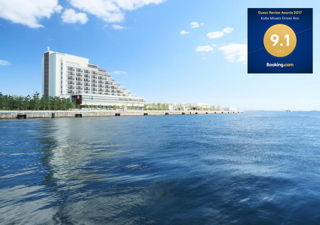 a view of a large body of water with a building at Kobe Minato Onsen Ren in Kobe