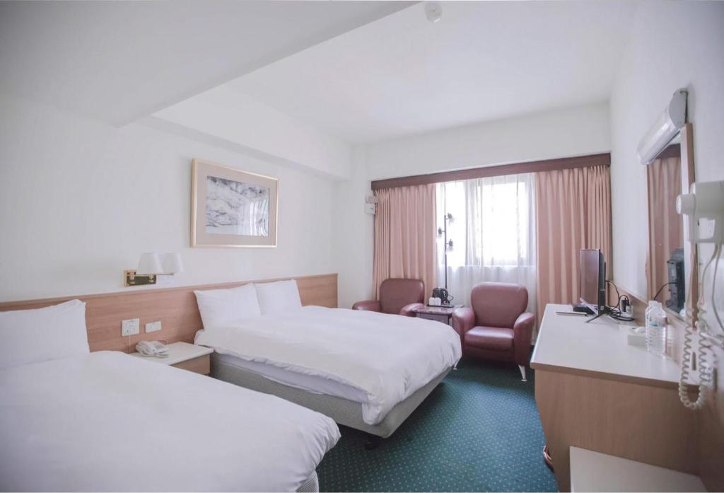 天津大飯店 房間的床