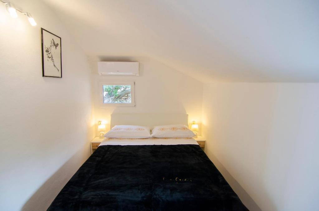 Postel nebo postele na pokoji v ubytování Holiday Home Bliss