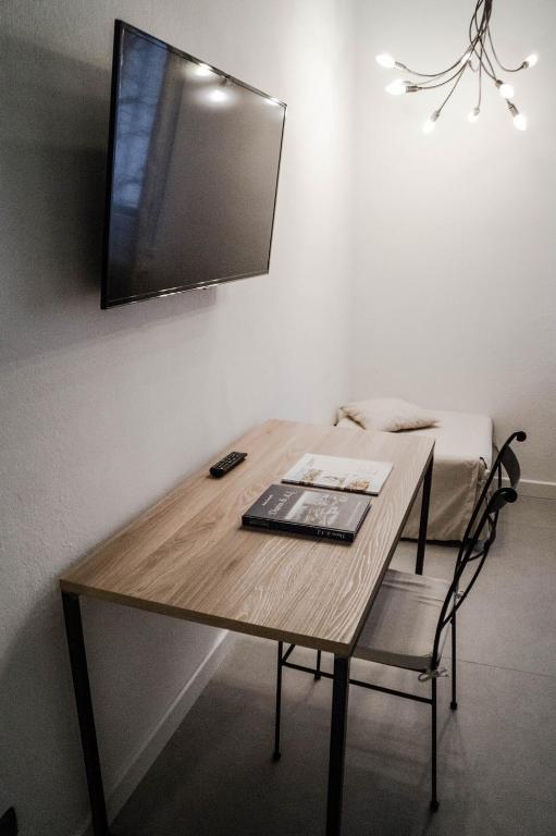 TV a/nebo společenská místnost v ubytování Casa Chiara B&B
