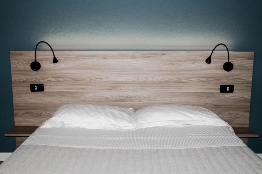Postel nebo postele na pokoji v ubytování Casa Chiara B&B