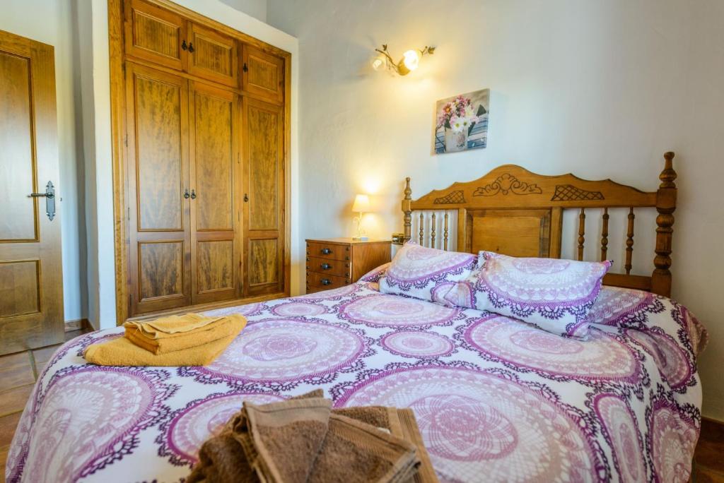 Posteľ alebo postele v izbe v ubytovaní Cubo's Casa La Viña