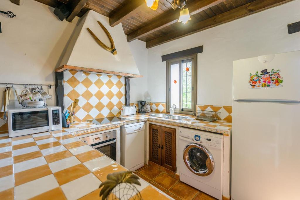 Kuchyňa alebo kuchynka v ubytovaní Cubo's Casa La Viña