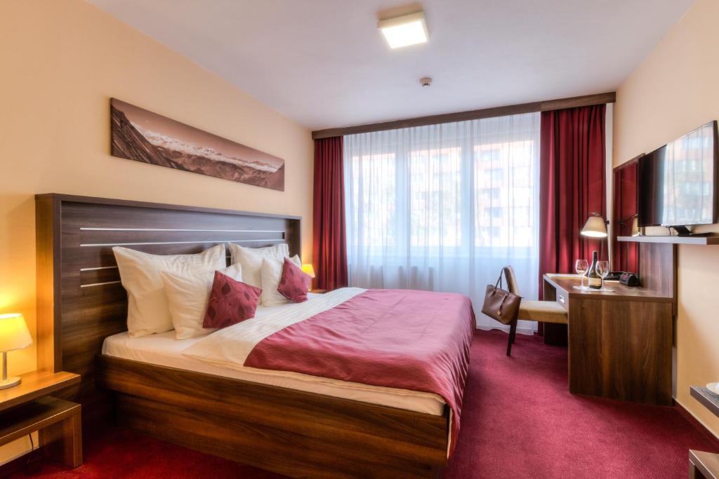 Postel nebo postele na pokoji v ubytování Best Western Hotel Vista