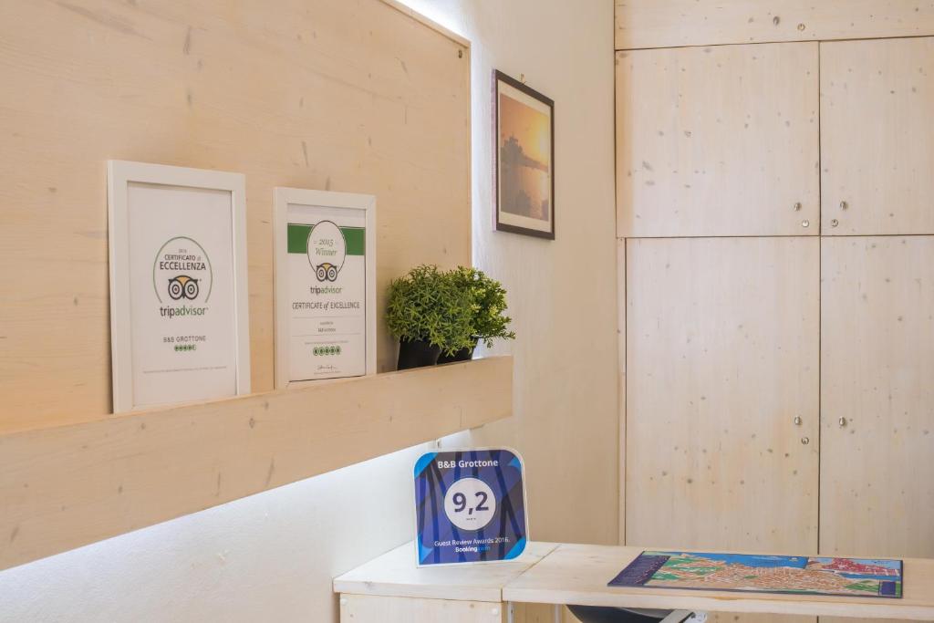 Certifikát, ocenenie alebo iný dokument vystavený v ubytovaní Dimora Grottone