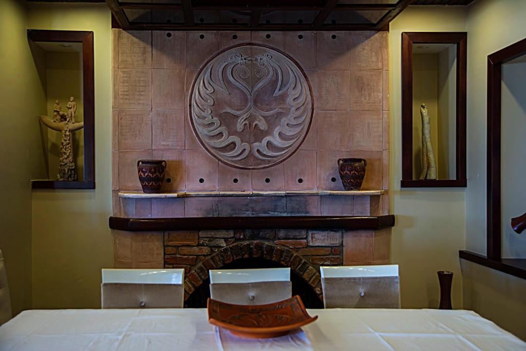 Postel nebo postele na pokoji v ubytování Iris Hotel & Spa