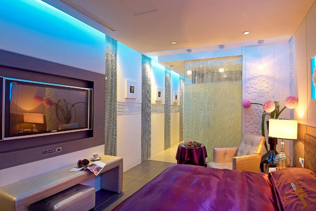 Posezení v ubytování Qi Hai Motel