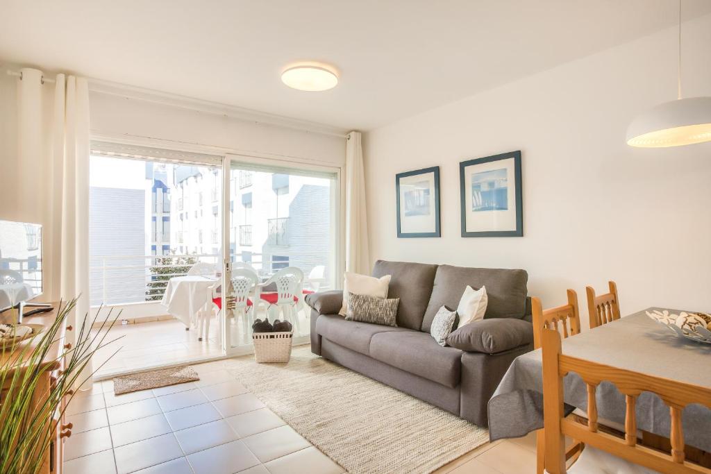 A seating area at Lets Holidays White apartment with terrace, ac & parking, near beach