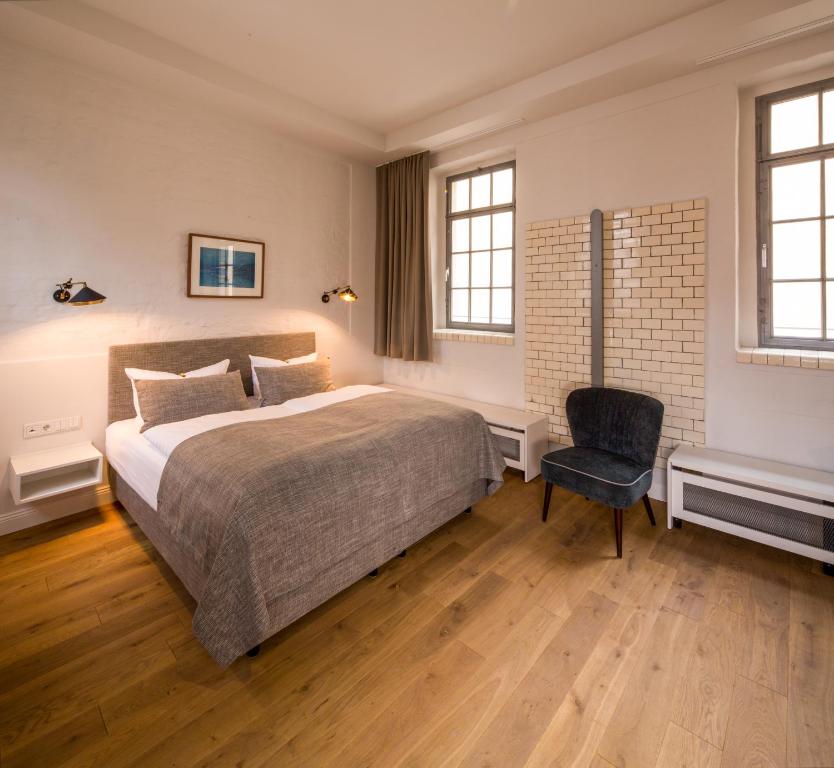 Postel nebo postele na pokoji v ubytování Hotel Oderberger