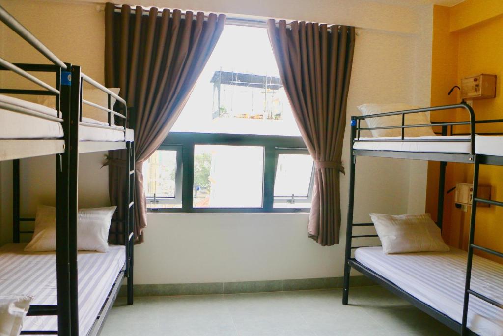 Giường trong phòng chung tại Bondi Backpackers Nhatrang