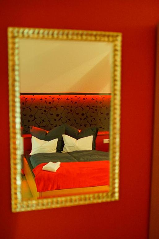 Postel nebo postele na pokoji v ubytování TIPTOP Hotel am Hochrhein