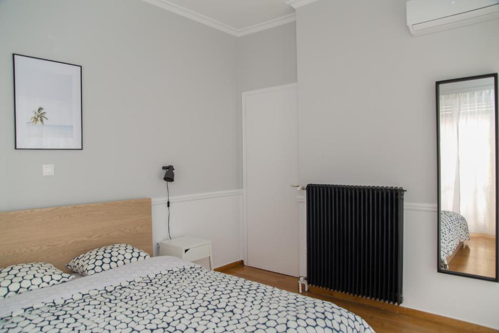 Posteľ alebo postele v izbe v ubytovaní Modern apartment next to Acropolis Athina