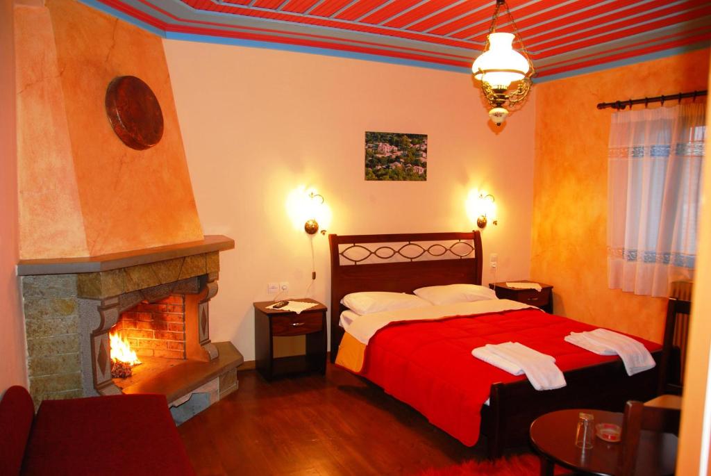 Postel nebo postele na pokoji v ubytování Hotel Ladias