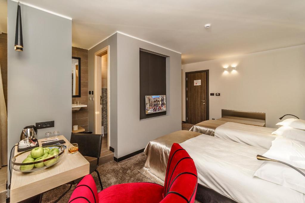 Posteľ alebo postele v izbe v ubytovaní The View Luxury Rooms