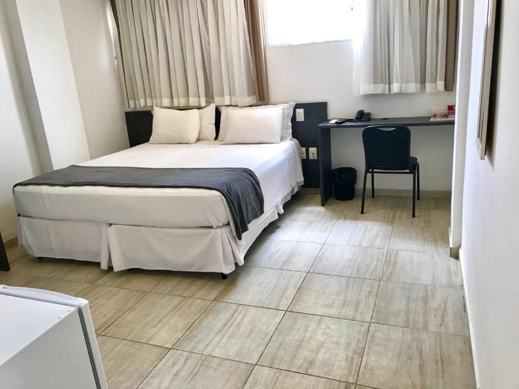 Cama ou camas em um quarto em Scenarium Hotel
