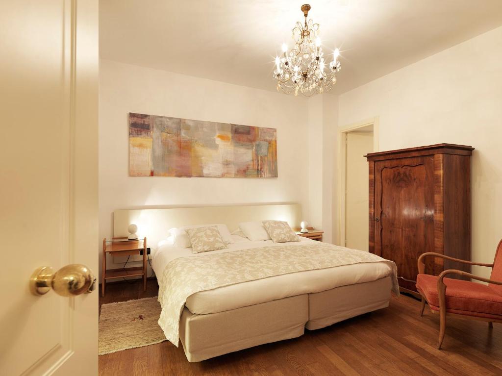 Postel nebo postele na pokoji v ubytování Boutique Hotel Albero Nascosto