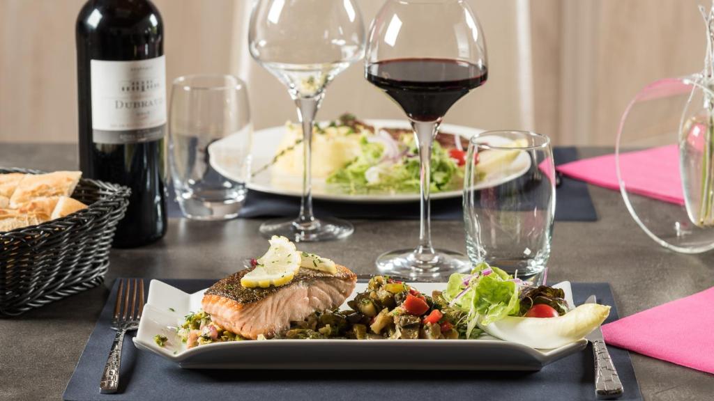 Nápoje v ubytování Hôtel Restaurant L'Evidence