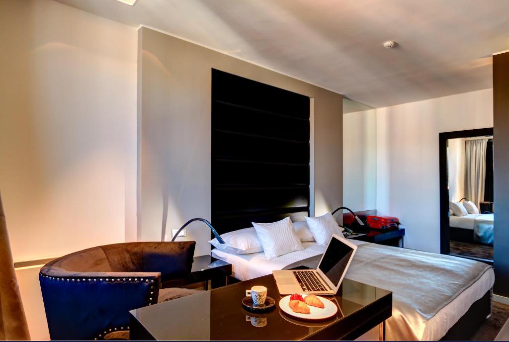 Posteľ alebo postele v izbe v ubytovaní The View Luxury Rooms