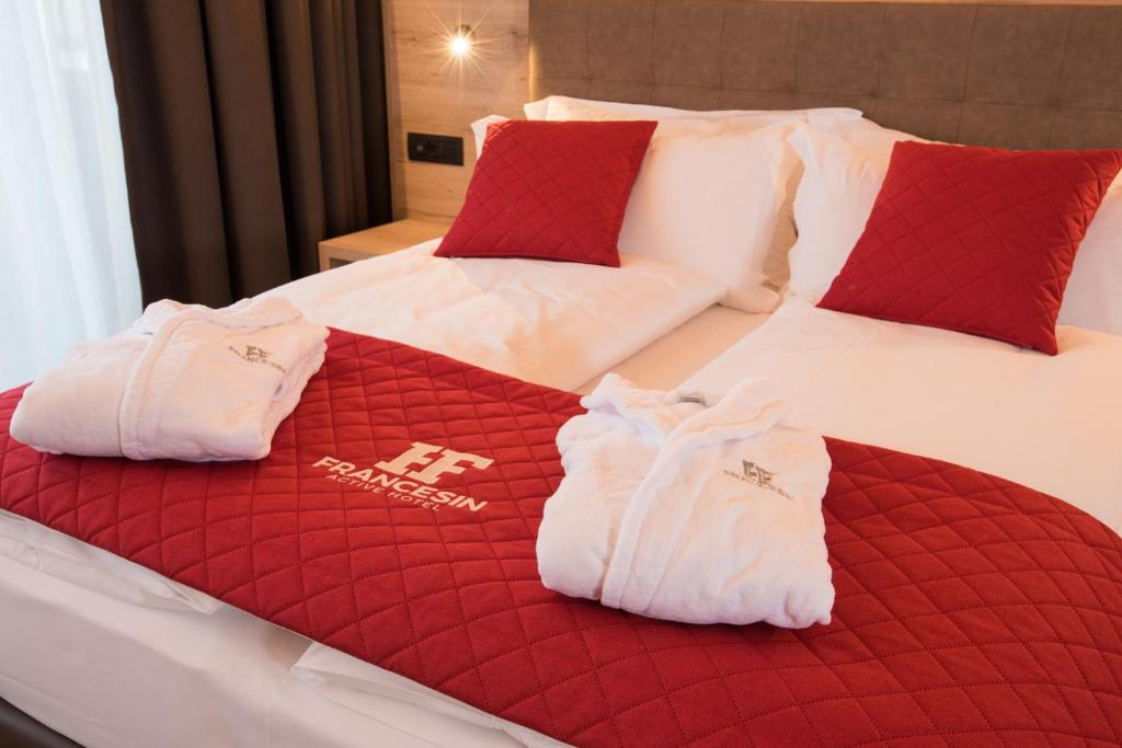 Postel nebo postele na pokoji v ubytování Francesin Active Hotel
