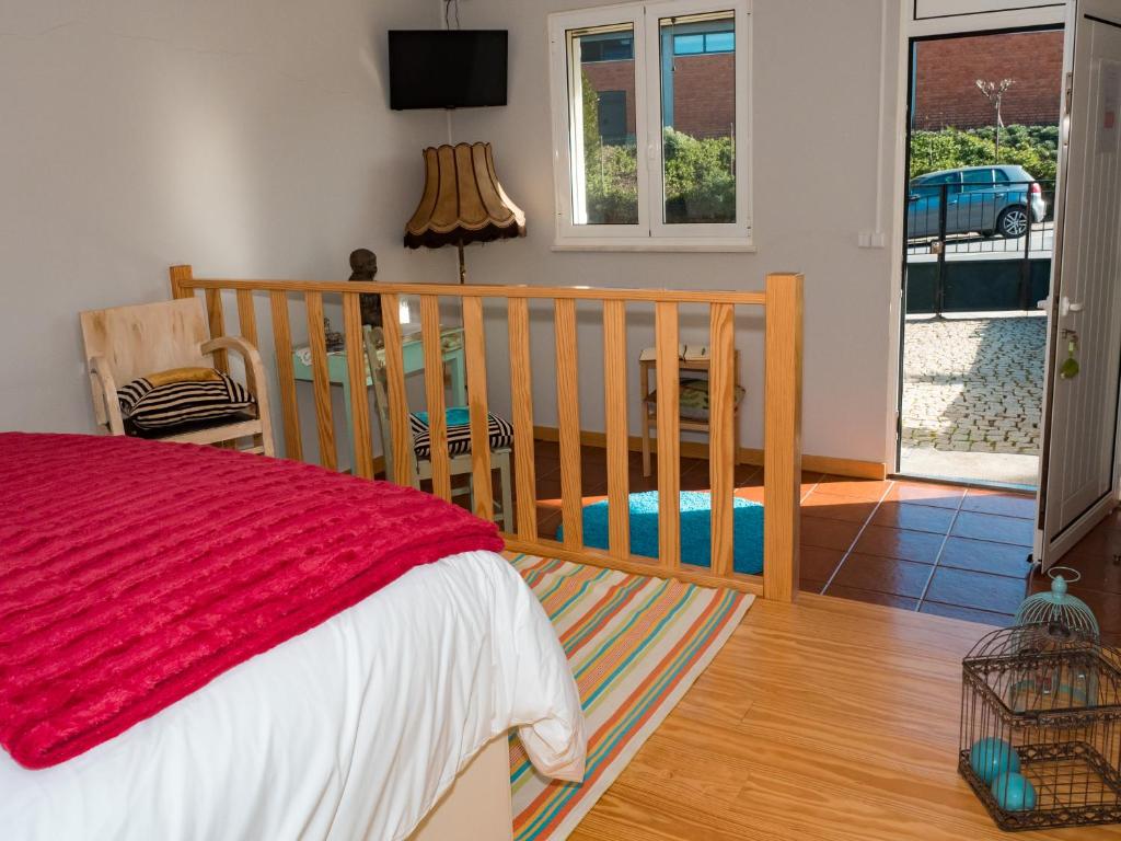Postel nebo postele na pokoji v ubytování Casa das Andorinhas