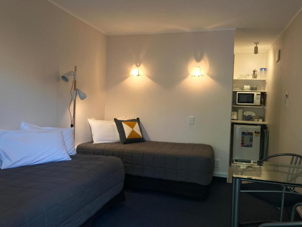 Kuchyň nebo kuchyňský kout v ubytování Edelweiss Motel