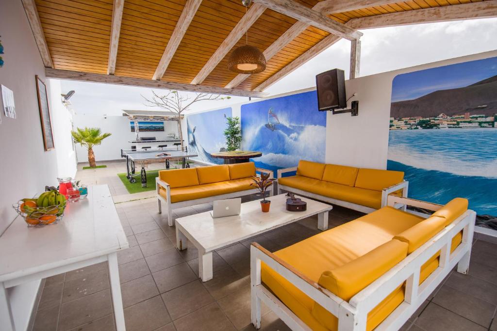 A television and/or entertainment centre at Surf Riders Fuerteventura