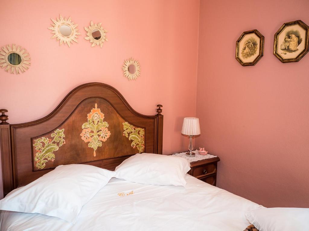 Postel nebo postele na pokoji v ubytování Casa das Andorinhas