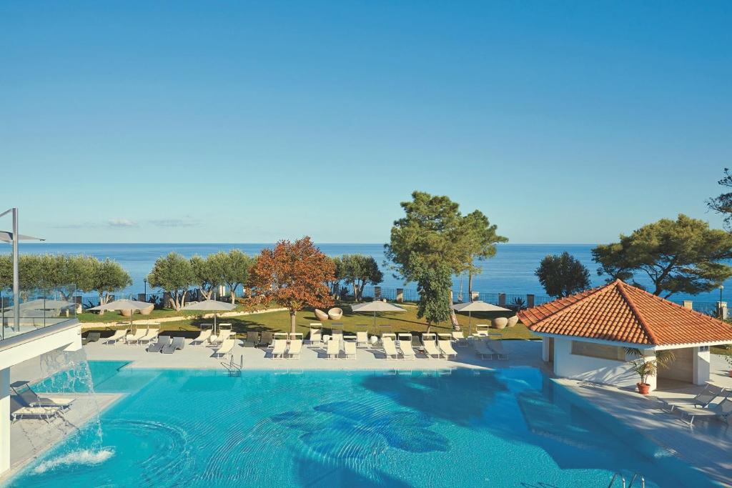 a view of a swimming pool at a resort at TUI BLUE Tropea in Santa Domenica