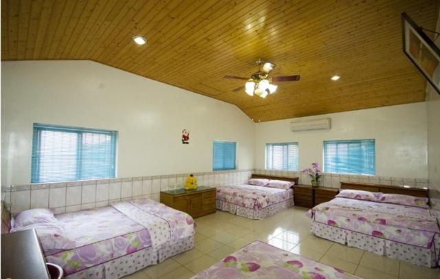 Postel nebo postele na pokoji v ubytování Fei Ying Homestay